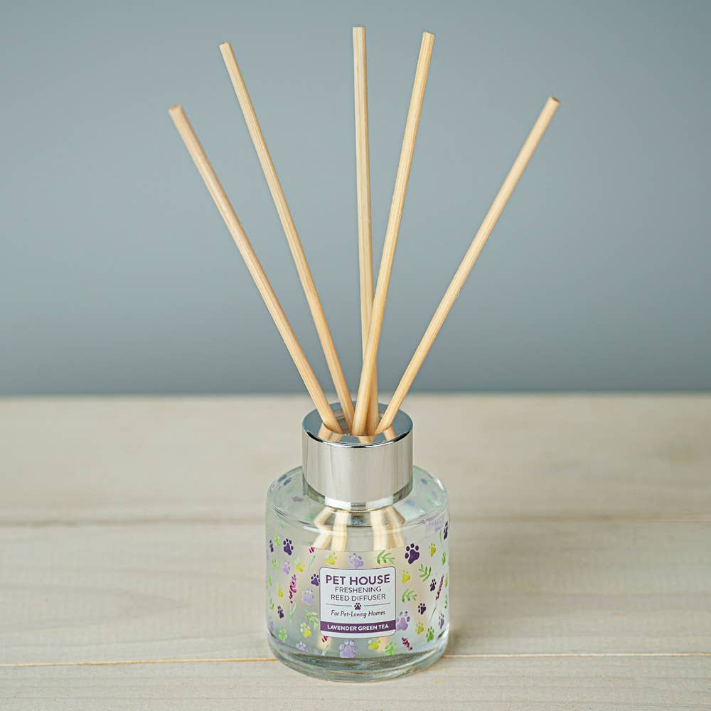 Mellow Monkey Pet House reed diffuser in Lavender Green Tea scent with paw print label in a glass bottle