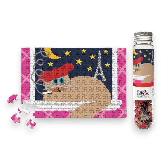 Mellow Monkey Le Chat micro puzzle featuring a cartoon cat wearing a red beret in front of the Eiffel Tower at night. 150 pieces.