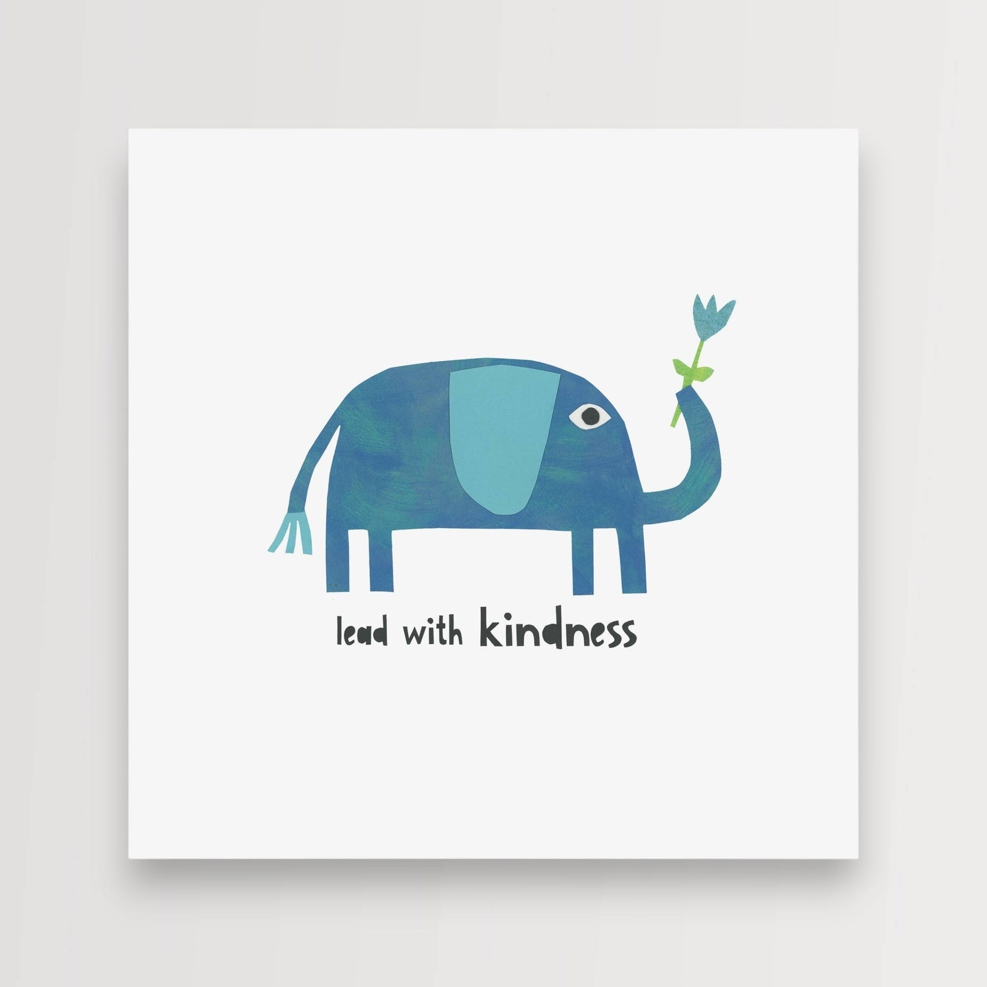 Mellow Monkey Lead with Kindness framed art print featuring a blue elephant holding a blue flower.