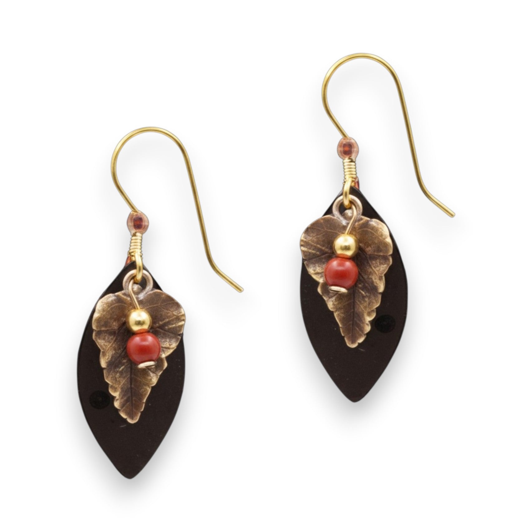Mellow Monkey Leaf On Warm Oval earrings featuring bronze leaf charms, red beads, and surgical steel ear wires.