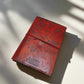 Mellow Monkey reddish-brown leather journal with embossed constellations and cord closure. 6"x9".