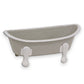 Mellow Monkey light gray iron bathtub soap dish with white rim and claw feet. Vintage design with drainage holes.