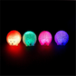 Mellow Monkey light up hedgehog sensory toys in orange, green, pink, and blue glowing on a black background.