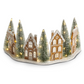 Mellow Monkey lighted gingerbread village half tree collar with LED lights, miniature houses, and snowy pine trees.