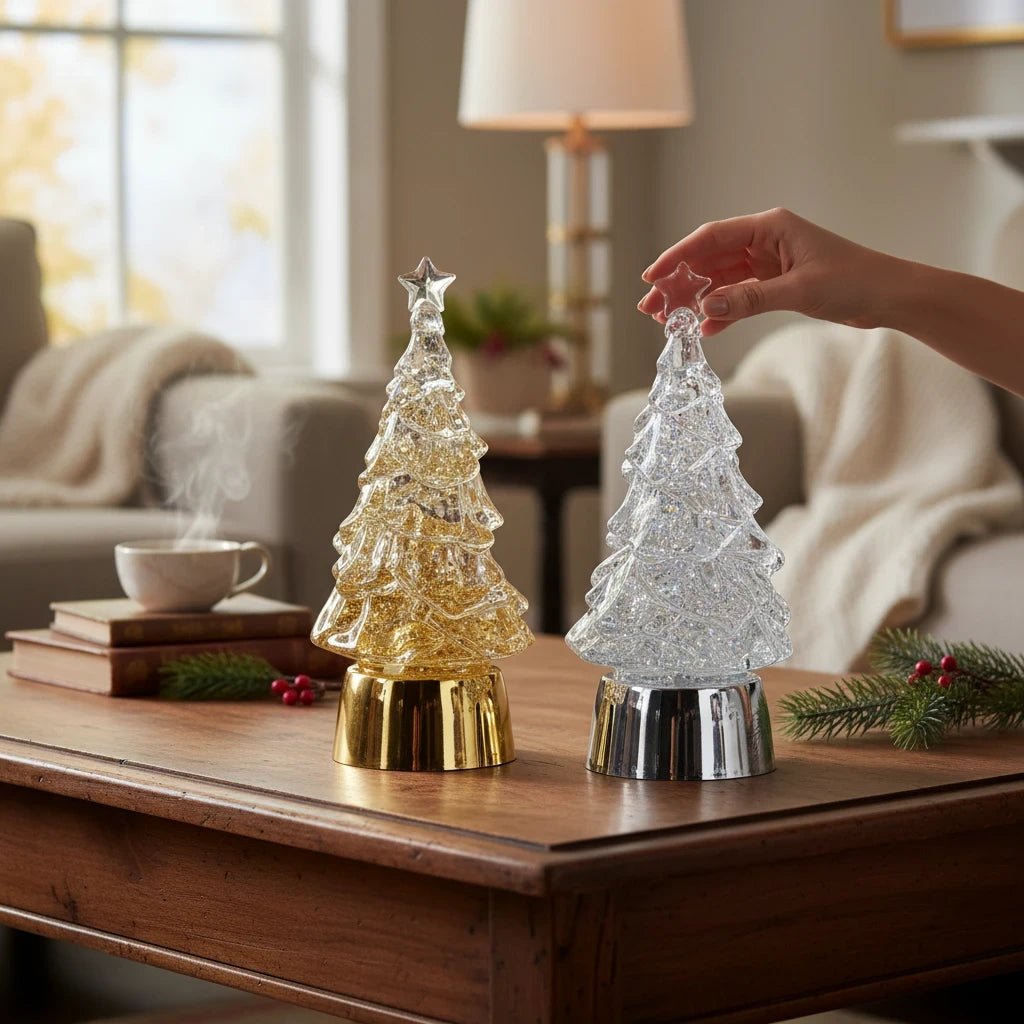 Mellow Monkey 5-inch lighted glitter water trees in gold and silver on a wooden table with festive holiday decor