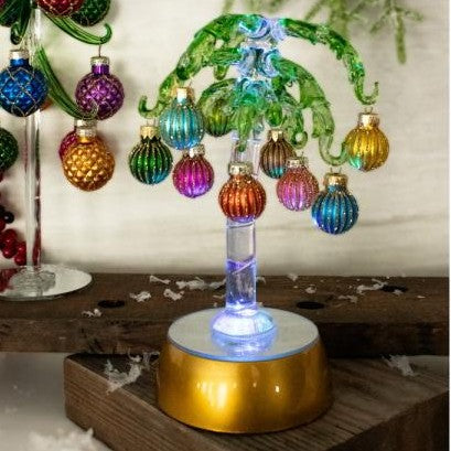 Mellow Monkey 9-inch green glass palm tree decoration with colorful mini ornaments and internal LED lighting