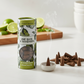 Mellow Monkey lime basil and mandarin scented incense cones with a small ceramic holder and decorative tube packaging.