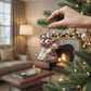 Mellow Monkey Little Elephant Old World Christmas blown glass ornament, silver with glitter accents, hanging on a tree.
