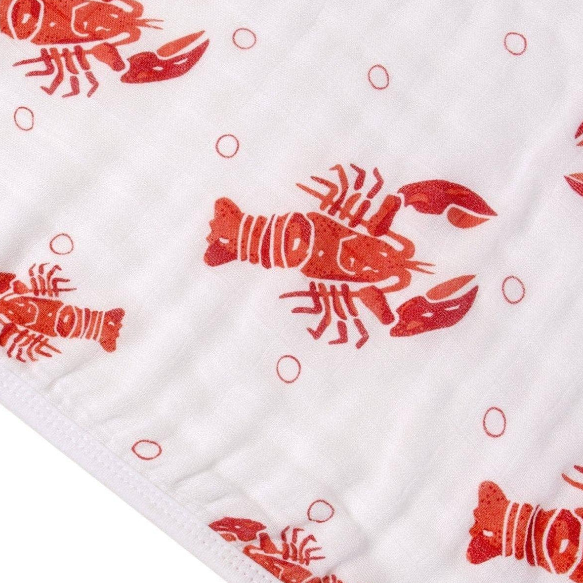 Mellow Monkey 2-in-1 baby burp cloth and bib featuring a red lobster and crawfish print on soft white muslin fabric.