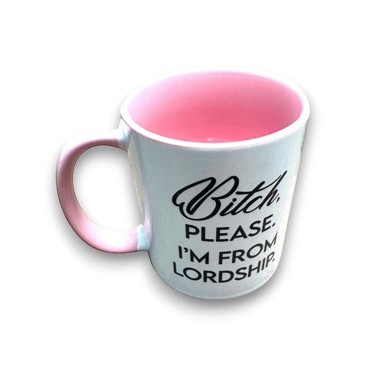Mellow Monkey white ceramic 11-oz coffee mug with pink interior and handle, featuring black text that reads "Bitch, Please. I'm From Lordship."