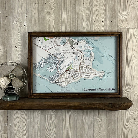 Mellow Monkey vintage Lordship Stratford nautical map in a brown reclaimed wood shadowbox frame on a rustic shelf.