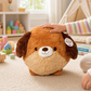 Mellow Monkey Lucky the Puppy round brown plush toy with soft fur being petted by a child in a playroom