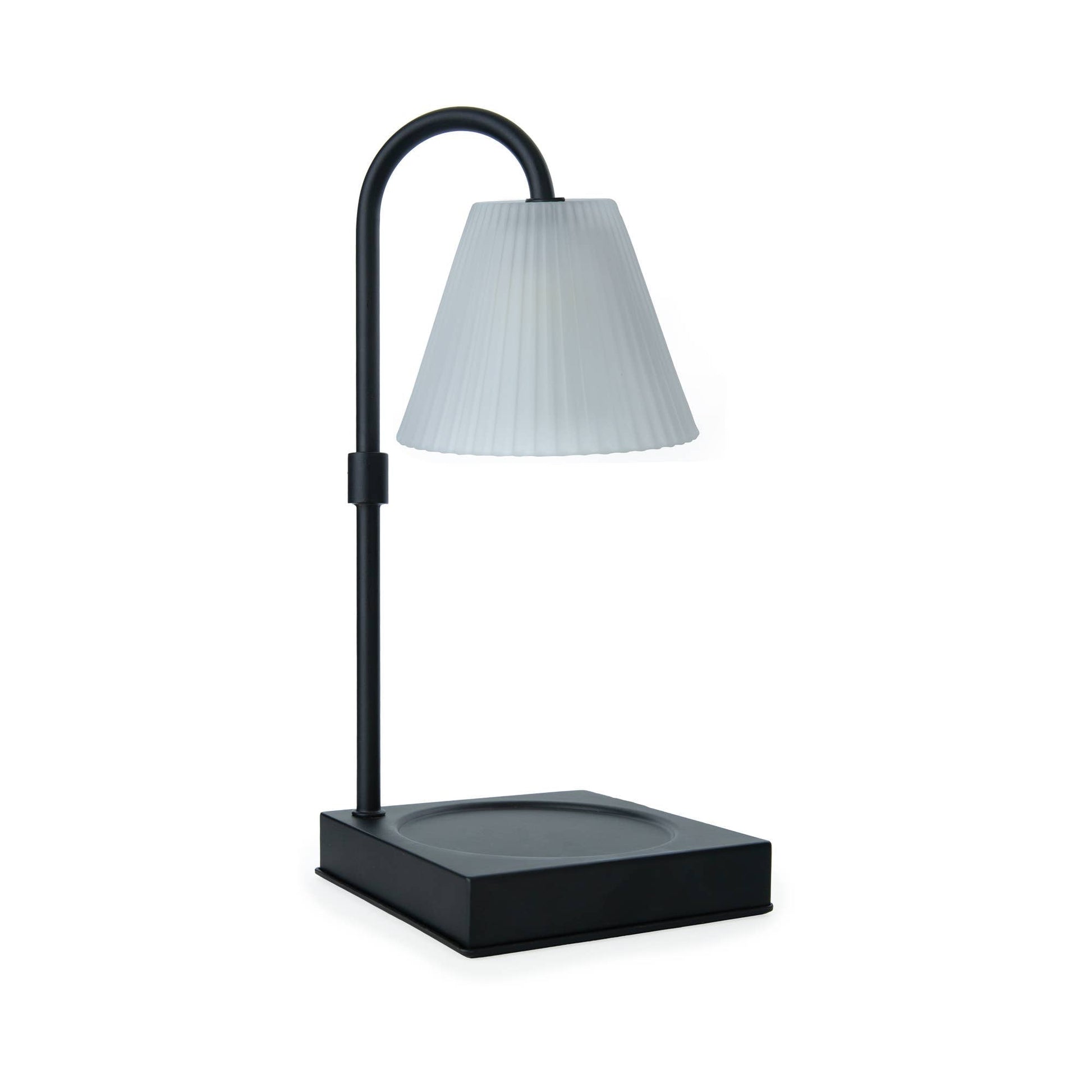Mellow Monkey Lumiere candle warmer lamp with a sleek black metal frame and a fluted clear glass shade.