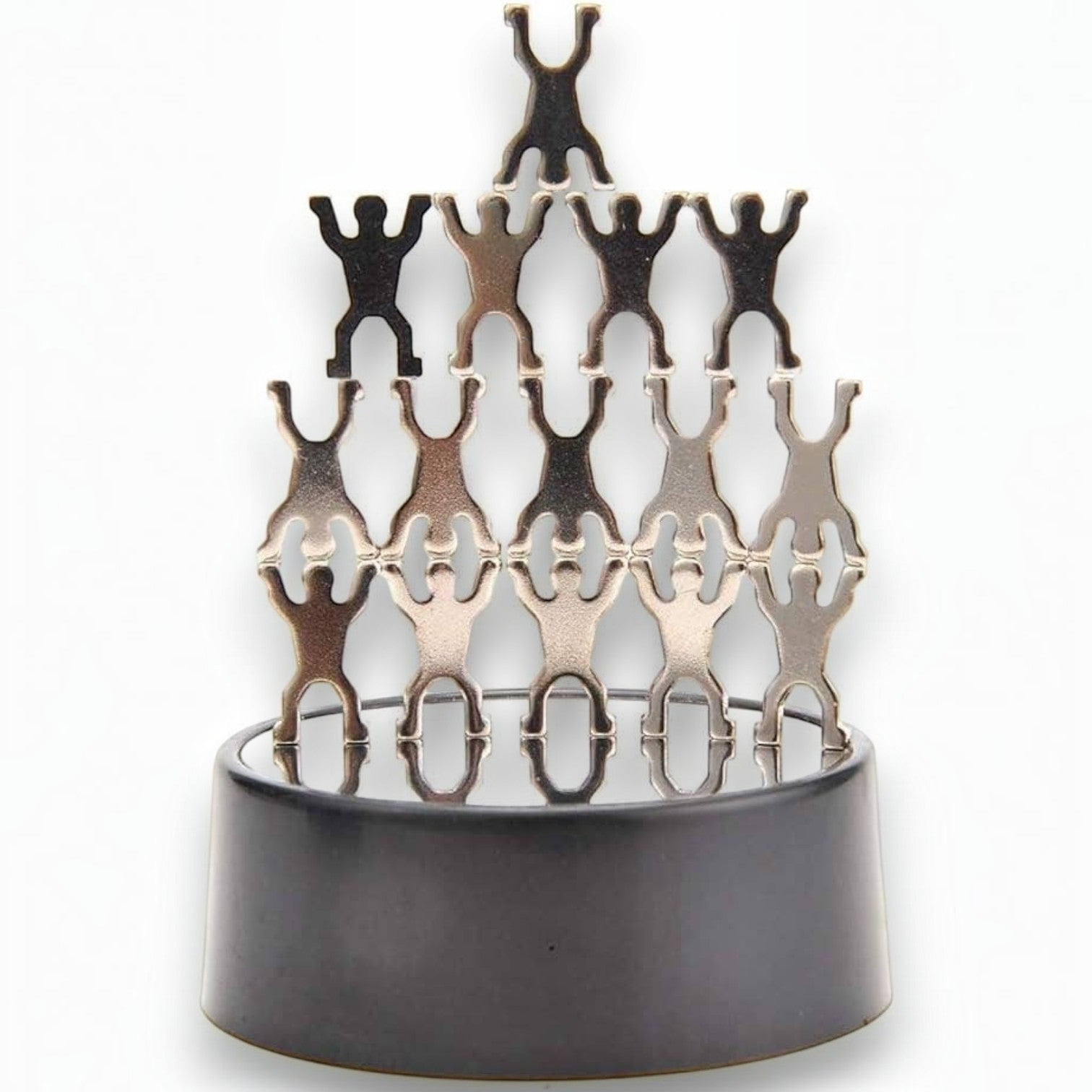 Mellow Monkey magnetic desktop sculpture featuring stainless steel humanoid figures stacked on a circular base.
