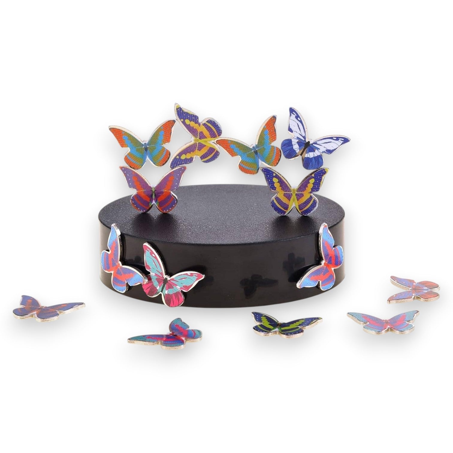 Mellow Monkey magnetic desktop sculpture featuring colorful stainless steel butterfly pieces on a black base.