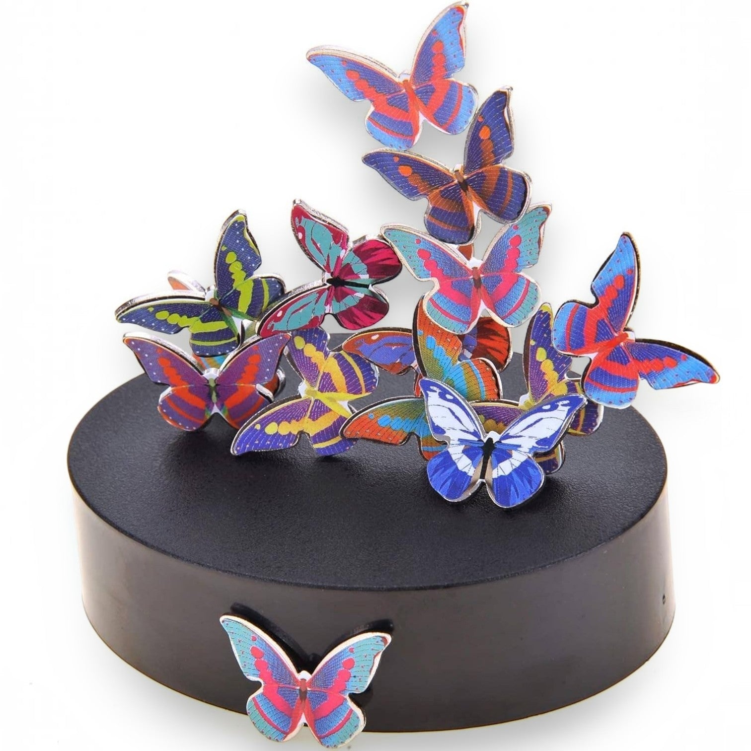 Mellow Monkey magnetic desktop sculpture featuring colorful stainless steel butterfly pieces on a black base.