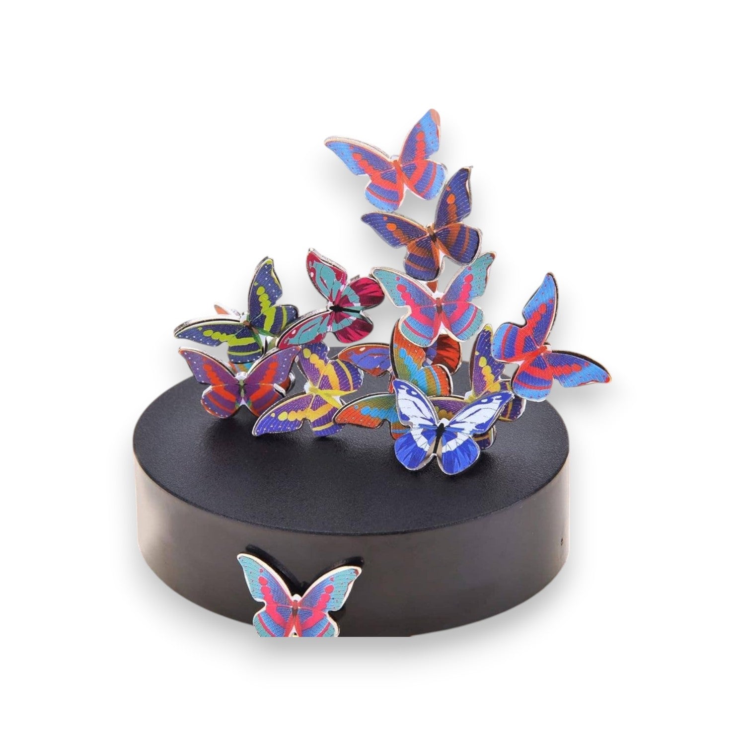 Mellow Monkey magnetic desktop sculpture featuring colorful stainless steel butterfly pieces on a black circular base.