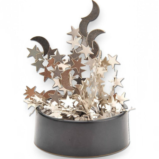 Mellow Monkey magnetic desktop sculpture featuring polished stainless steel moon and star shapes on a black base.