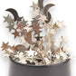 Mellow Monkey magnetic desktop sculpture featuring polished stainless steel moon and star shapes on a black base.