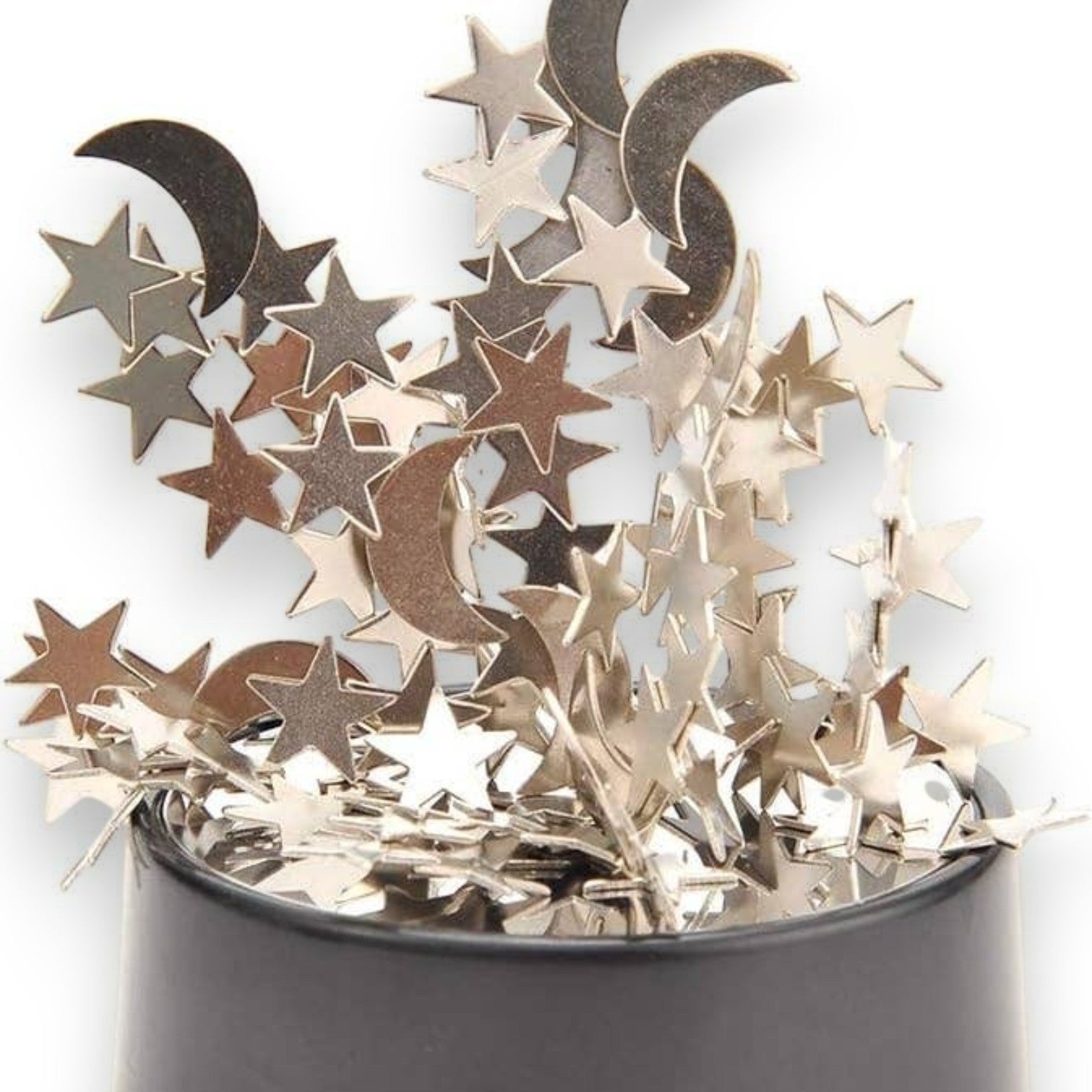 Mellow Monkey magnetic desktop sculpture featuring polished stainless steel moon and star shapes on a black base.