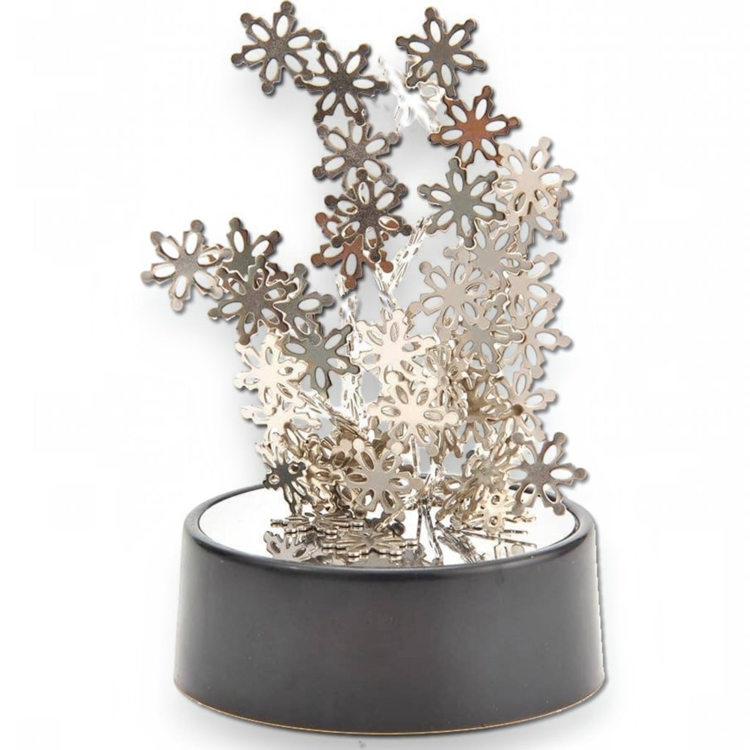 Mellow Monkey magnetic desktop sculpture featuring silver stainless steel snowflake pieces on a black circular base.