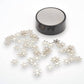 Mellow Monkey magnetic desktop sculpture with stainless steel snowflake pieces and a circular magnetic base.