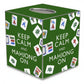 Mellow Monkey green papier mache tissue box cover featuring Keep Calm and Mahjong On text and mahjong tile patterns.