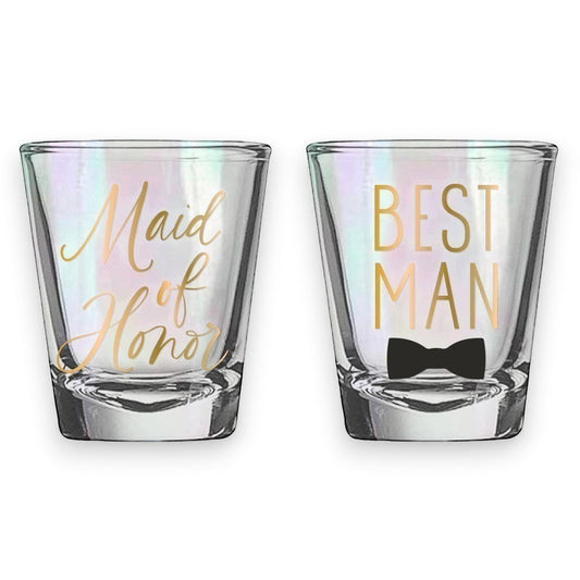 Mellow Monkey set of 2 iridescent shot glasses, one reads "Maid of Honor" and the other "Best Man" with a bow tie graphic.