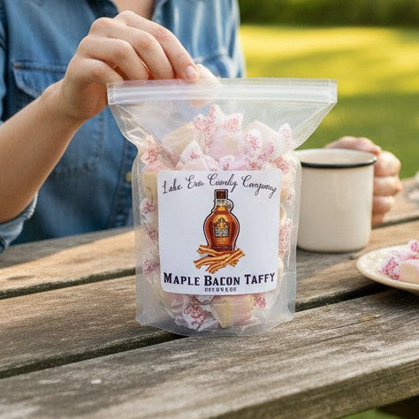 Mellow Monkey Maple Bacon Taffy, a unique sweet and salty candy with pink and tan swirls, individually wrapped.