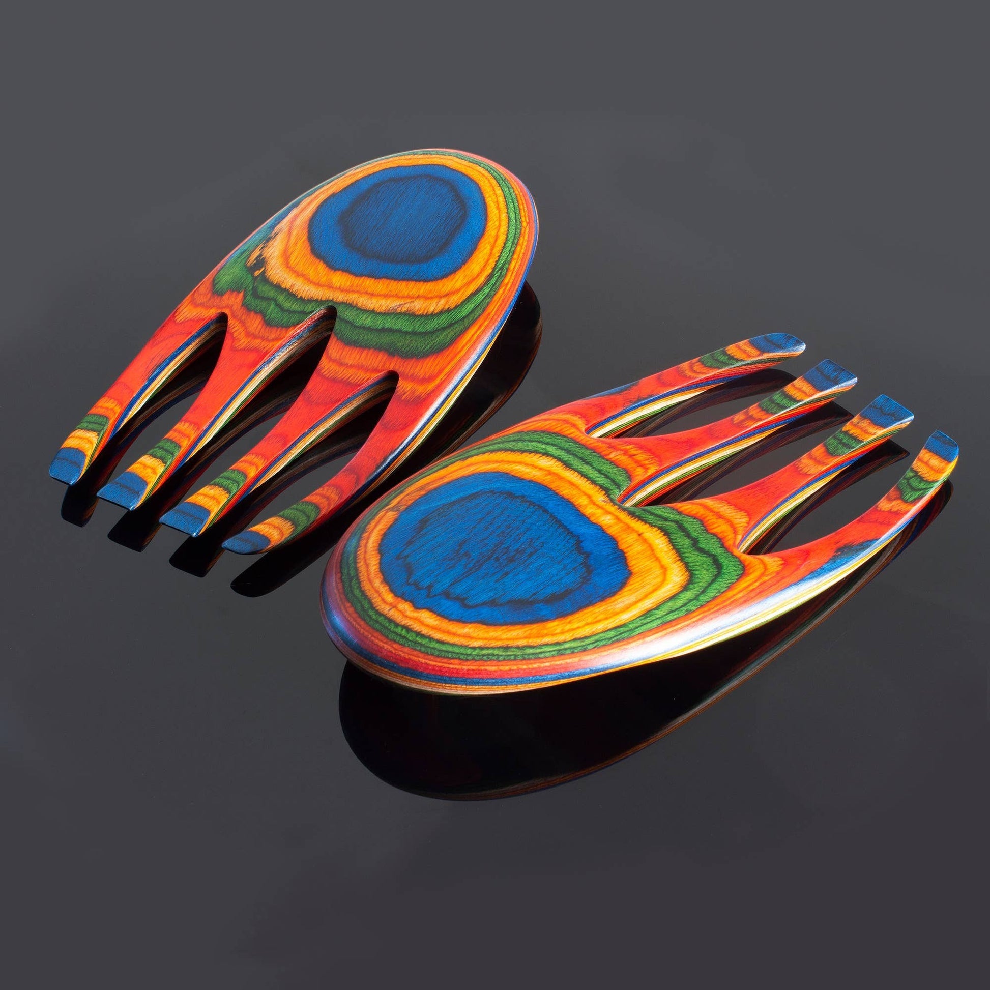 Mellow Monkey Marrakesh Salad Hands, ergonomic wooden salad servers in vibrant rainbow colors with blue centers.