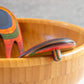 Mellow Monkey Marrakesh Salad Hands in rainbow wood, ergonomic hand shape for easy salad tossing.