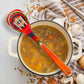 Mellow Monkey Marrakesh Collection wooden slotted spoon with colorful swirls, 12.5-in