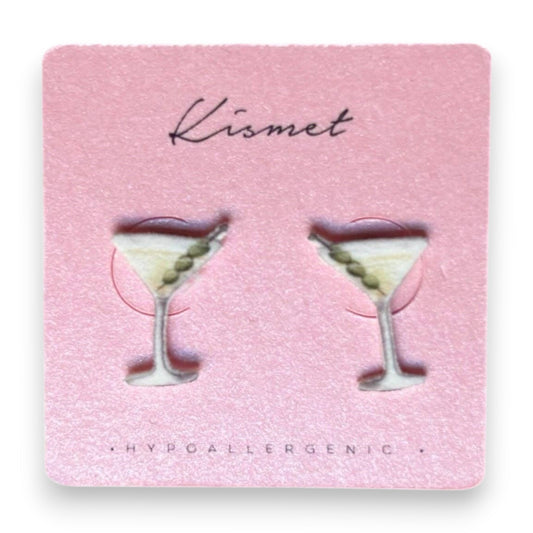 Mellow Monkey martini cocktail stud earrings with olive garnish on a pink display card, hypoallergenic design.