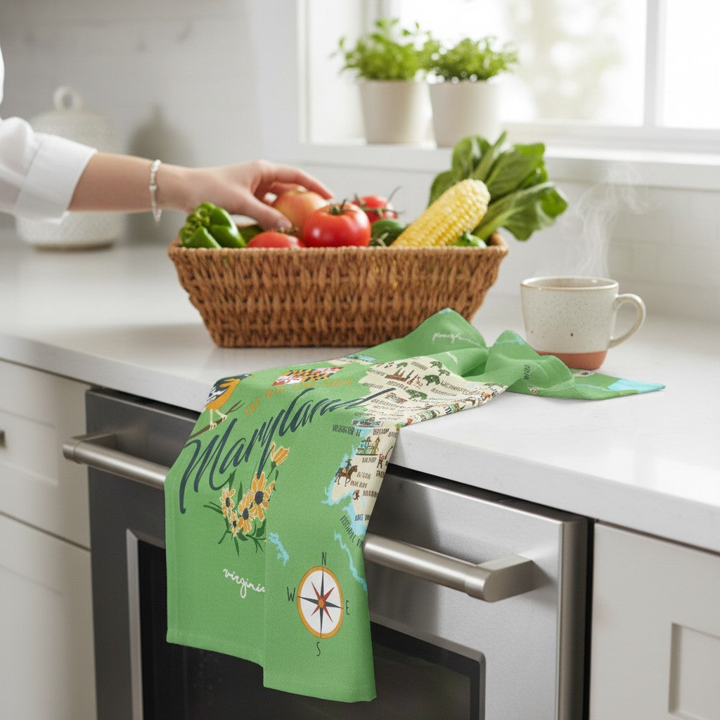 Mellow Monkey Maryland map tea towel with original artwork, featuring towns, attractions, an oriole bird, and flowers. 100% cotton.