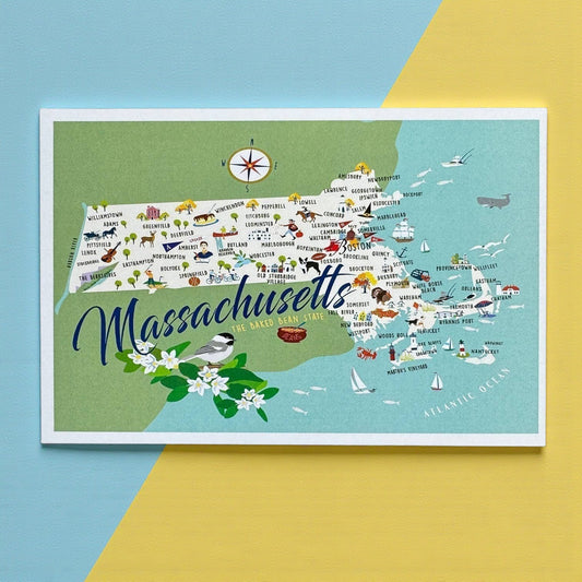 Mellow Monkey Massachusetts postcard map with illustrations of towns, landmarks, and wildlife. Features a chickadee bird and flowers.