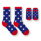 Mellow Monkey matching star-patterned socks for humans and pets in blue, white, and red polyester-spandex blend.