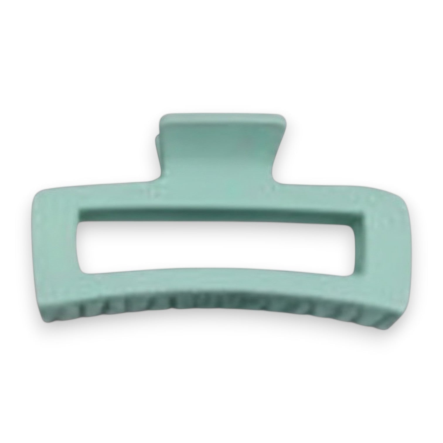 Mellow Monkey jumbo matte rectangle hair claws in an assortment of 11 pastel and neutral colors with cut-out design.