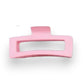 Mellow Monkey jumbo matte rectangle hair claws in an assortment of 11 pastel and neutral colors with cut-out designs.