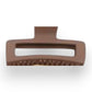Mellow Monkey jumbo matte rectangle hair claws in an assortment of 11 pastel and neutral colors with cut-out design.