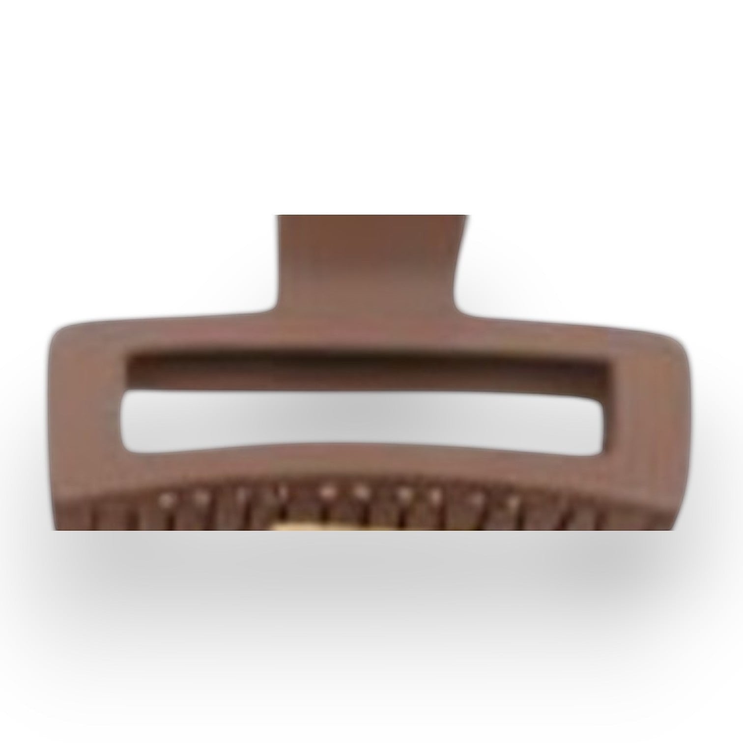 Mellow Monkey jumbo matte rectangle hair claws in an assortment of 11 pastel and neutral colors with cut-out design.