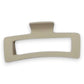 Mellow Monkey jumbo matte rectangle hair claws in an assortment of 11 pastel and neutral colors with cut-out design.