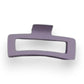 Mellow Monkey jumbo matte rectangle hair claws in assorted pastel and neutral colors with cut-out design.
