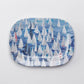 Mellow Monkey large melamine platter with a "Race Day" design of many white sailboats on blue water.
