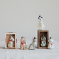 Mellow Monkey vintage-style mercury glass dog ornaments with hand-painted details in various metallic finishes.