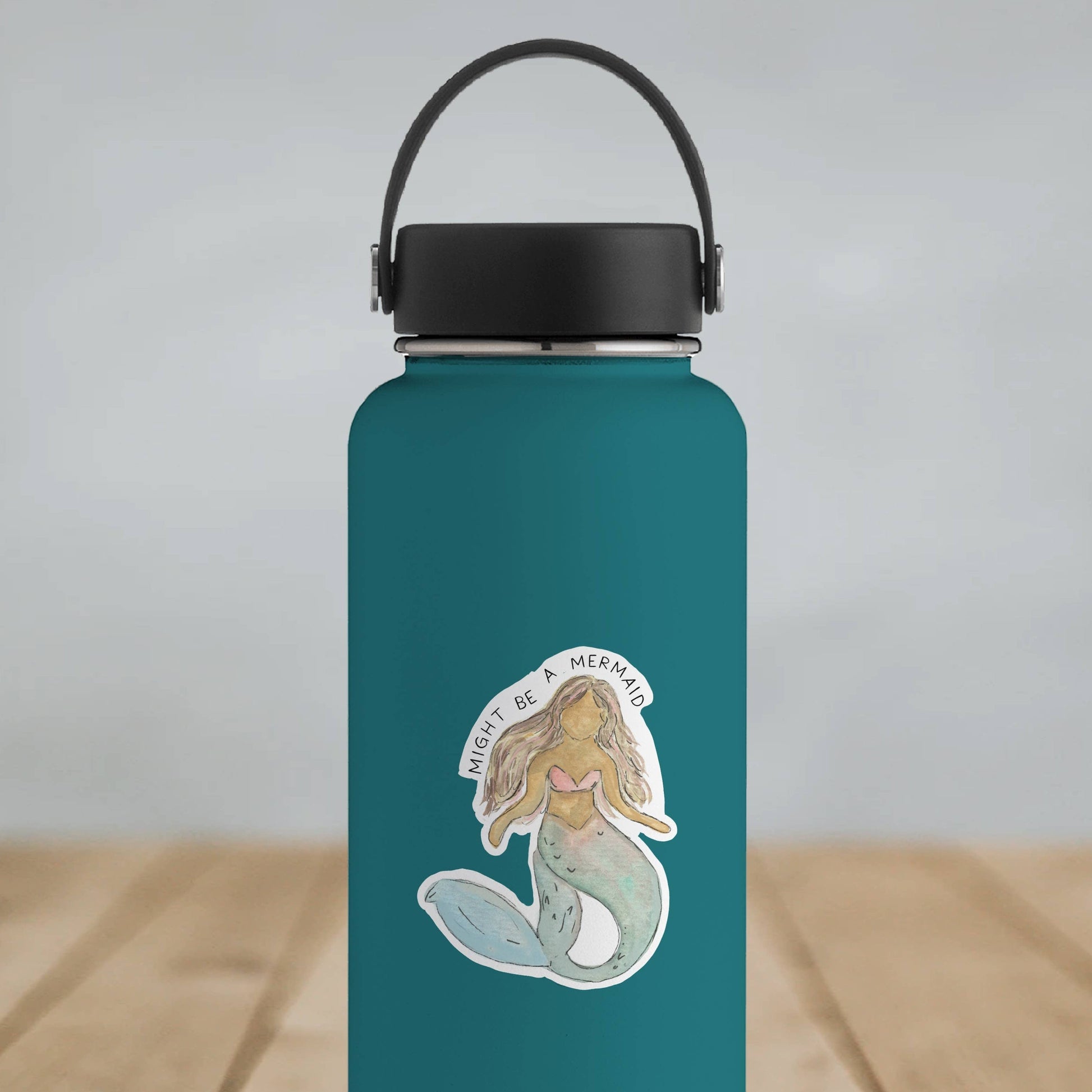 Mellow Monkey watercolor mermaid vinyl decal with "Might Be A Mermaid" text. Waterproof and durable.