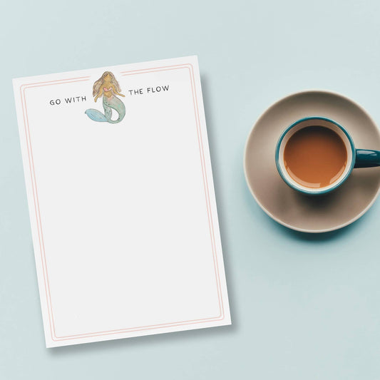 Mellow Monkey Go With The Flow mermaid notepad with watercolor illustration and pink border. 5.5" x 8" with 50 tear-off pages.