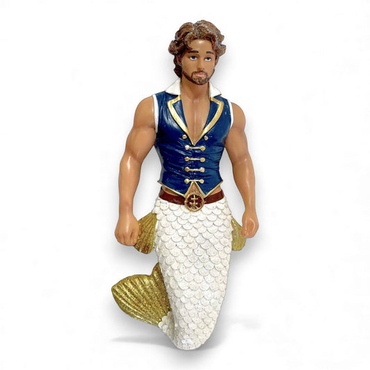Mellow Monkey Salty Seamen merman ornament with white scaled tail and blue vest with gold trim.