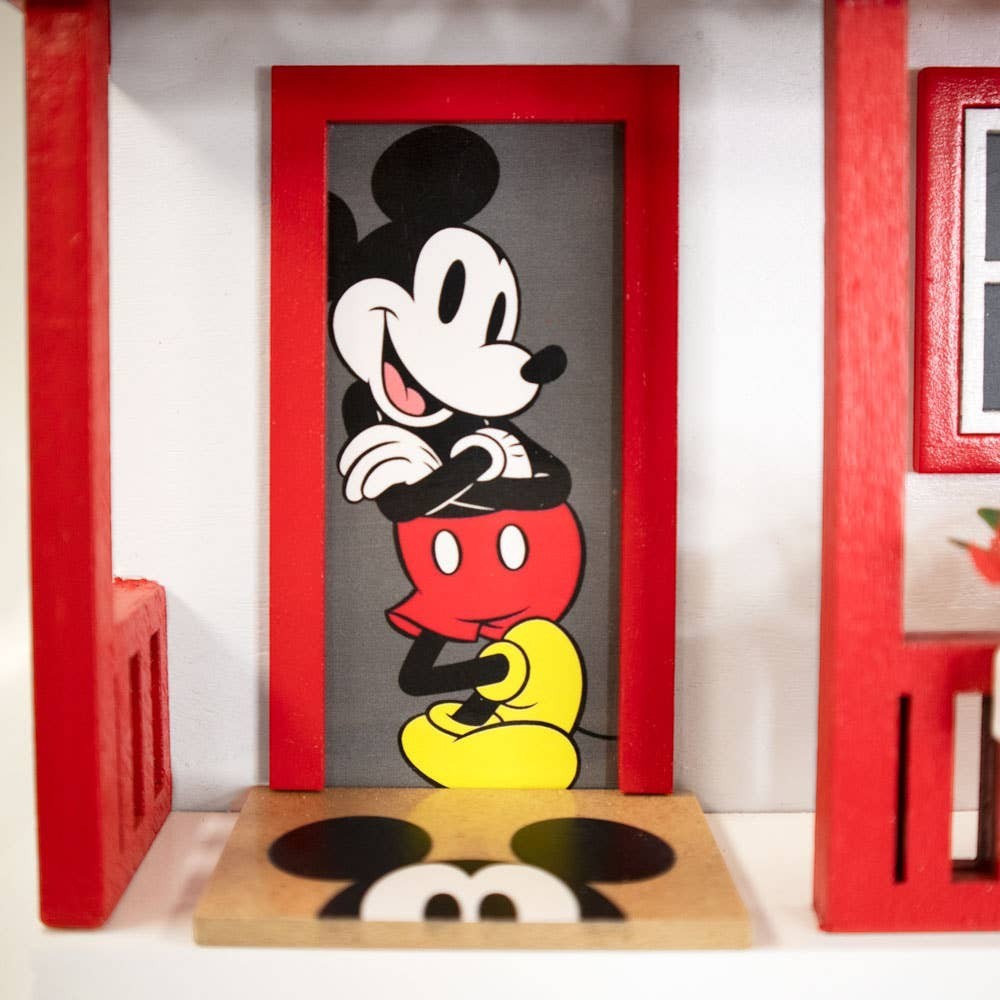 Mellow Monkey Mickey Cottage Birdhouse with Mickey Mouse graphic, red trim, and wooden base.