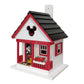 Mellow Monkey Mickey Cottage birdhouse with red trim, black roof, and Mickey Mouse cutout. Features Mickey graphic on door and flower box.