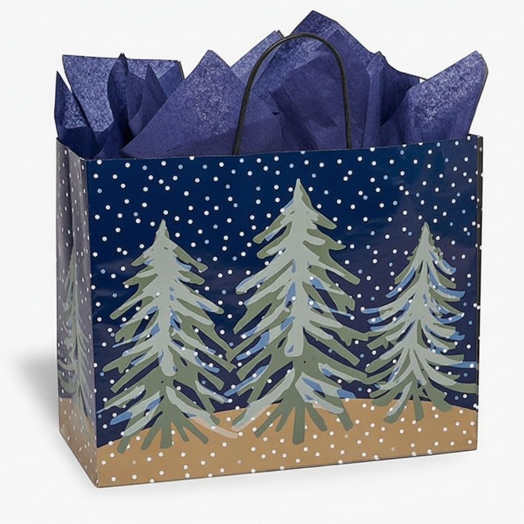 Mellow Monkey large gift bag with midnight snowfall and pine tree print, glossy finish, and dark blue tissue paper.